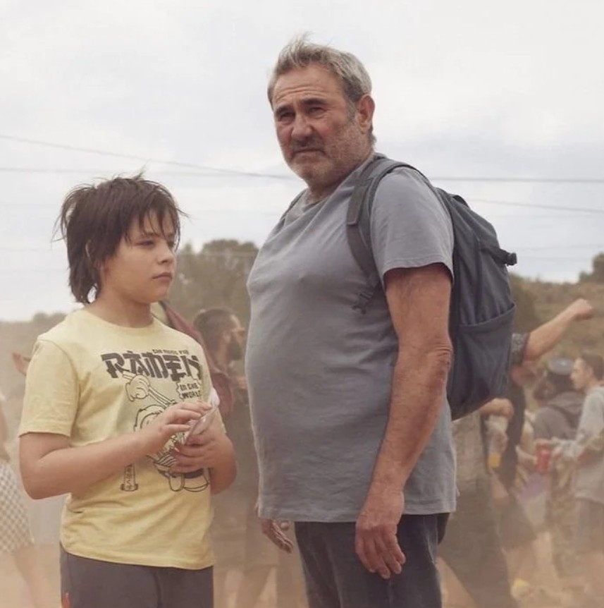 Bruno Núñez Arjona (as Esteban) with his on-screen father Sergi López (as Luis) in Sirāt