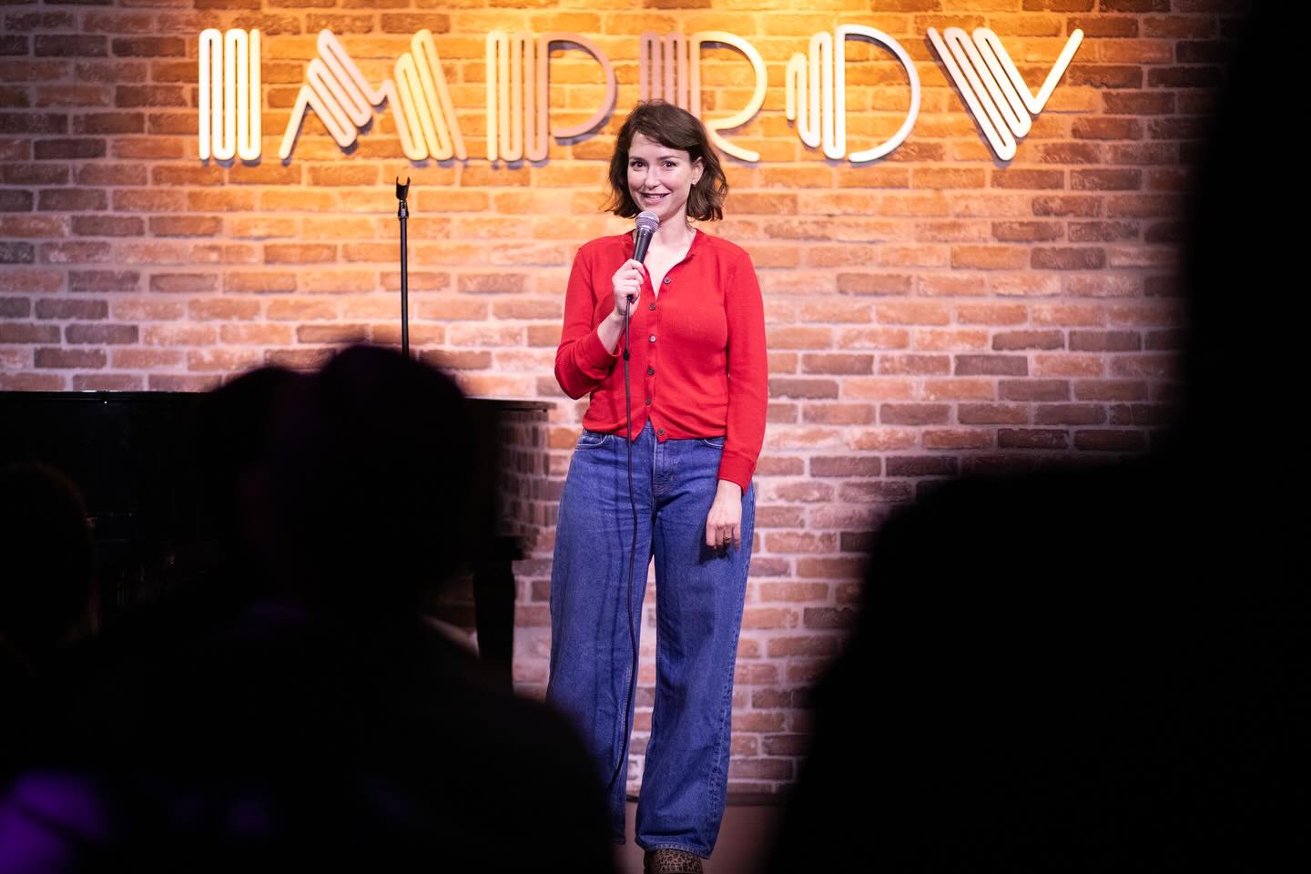 Milana Vayntrub performing at Hollywood Improv in March 2026