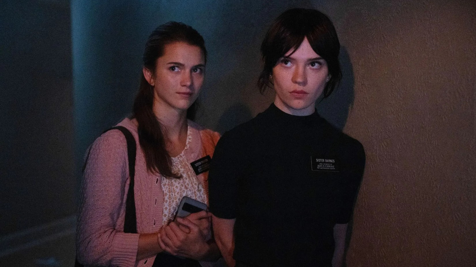 Chloe East and Sophie Thatcher in A24's 'Heretic'