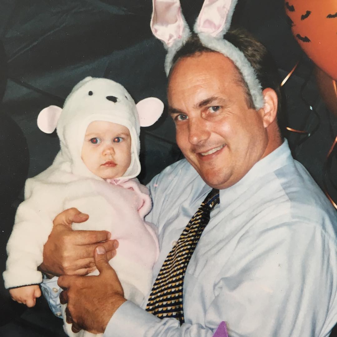 A baby Chloe East being held by her father Howard East
